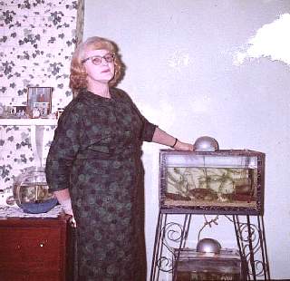 vera dagion with aquariums 1959 at 142 lander street newburgh ny.jpg